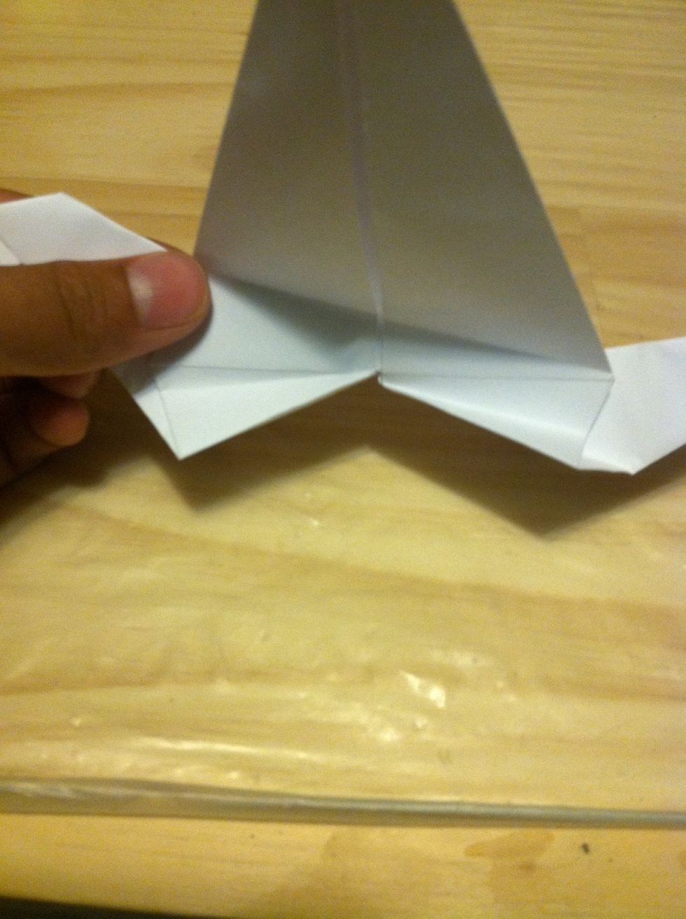 Fold the "feet" (there's not really any guidelines for these folds)