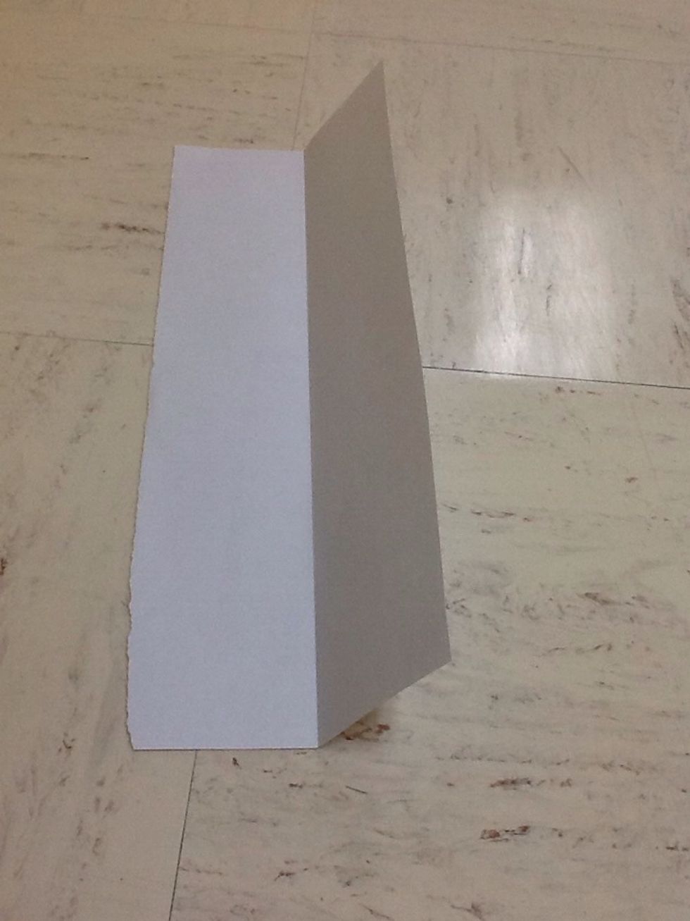 Fold the half sheet in half