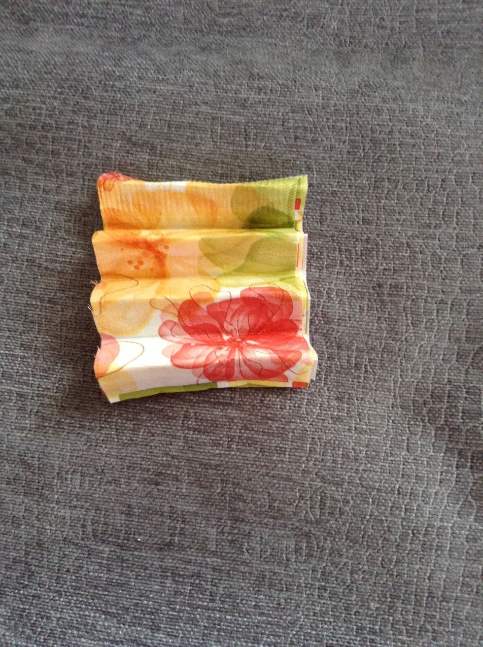 Fold the halve into a harmonica shaped piece