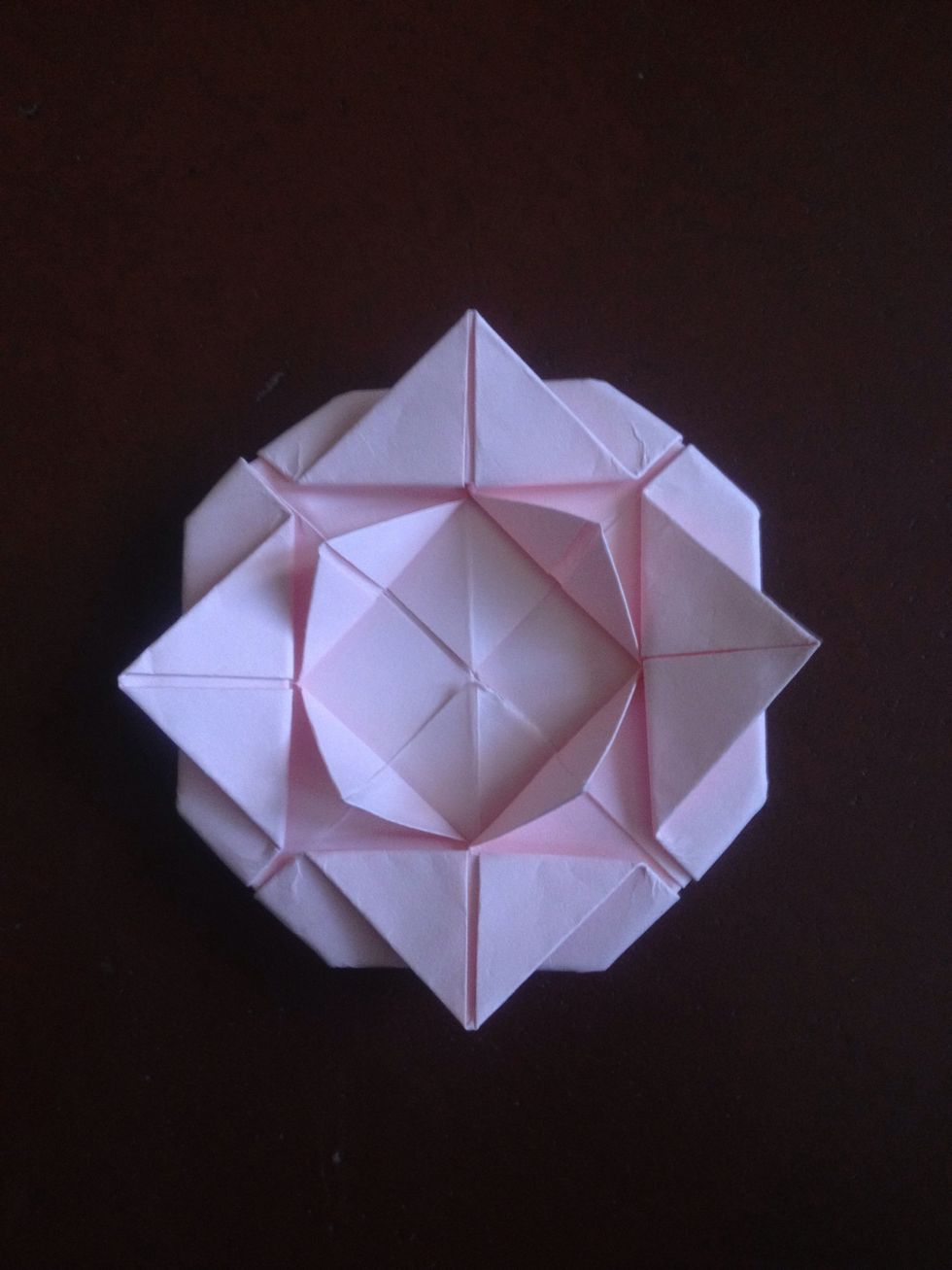 Fold the inner corners outward again..