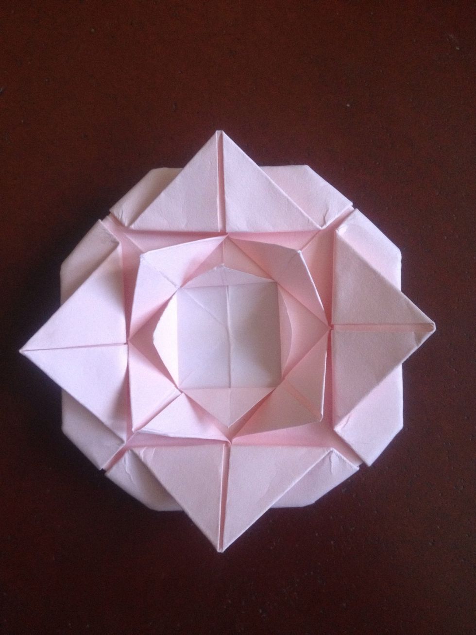 Fold the inner corners outward once more ...