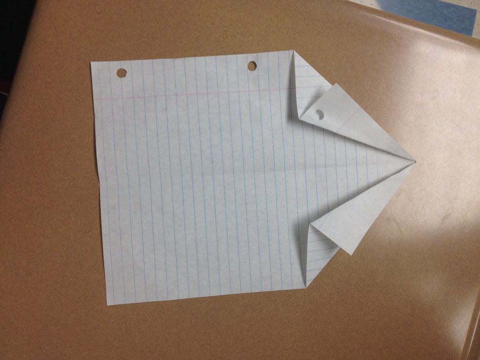 Fold the inside corners of the previous fold outside