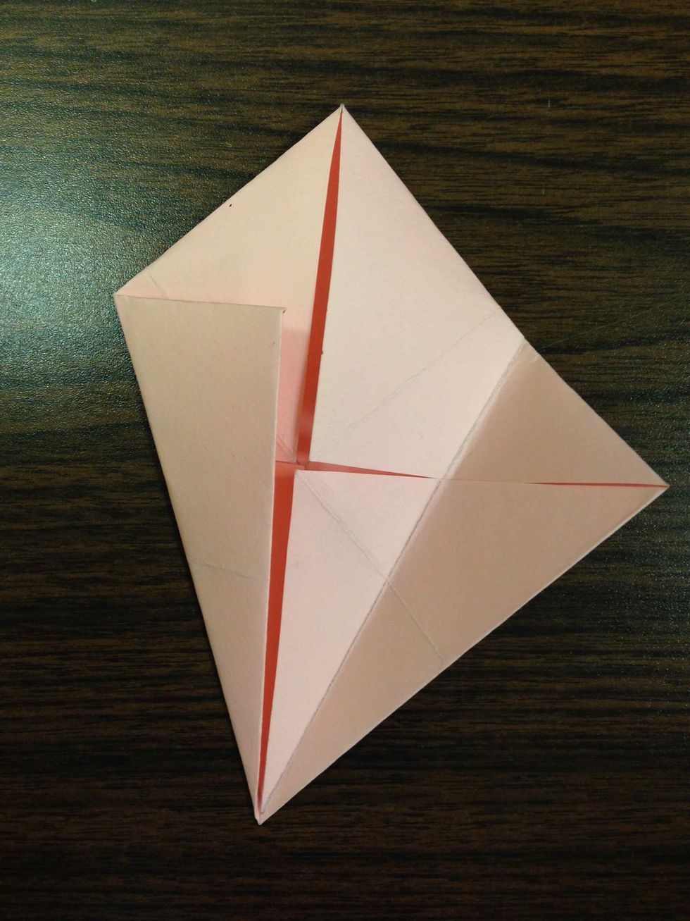 Fold the left and right edge to the middle.