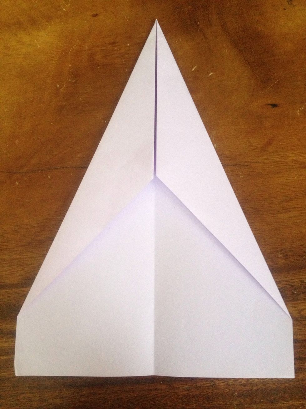 Fold the left corners to meet center line again