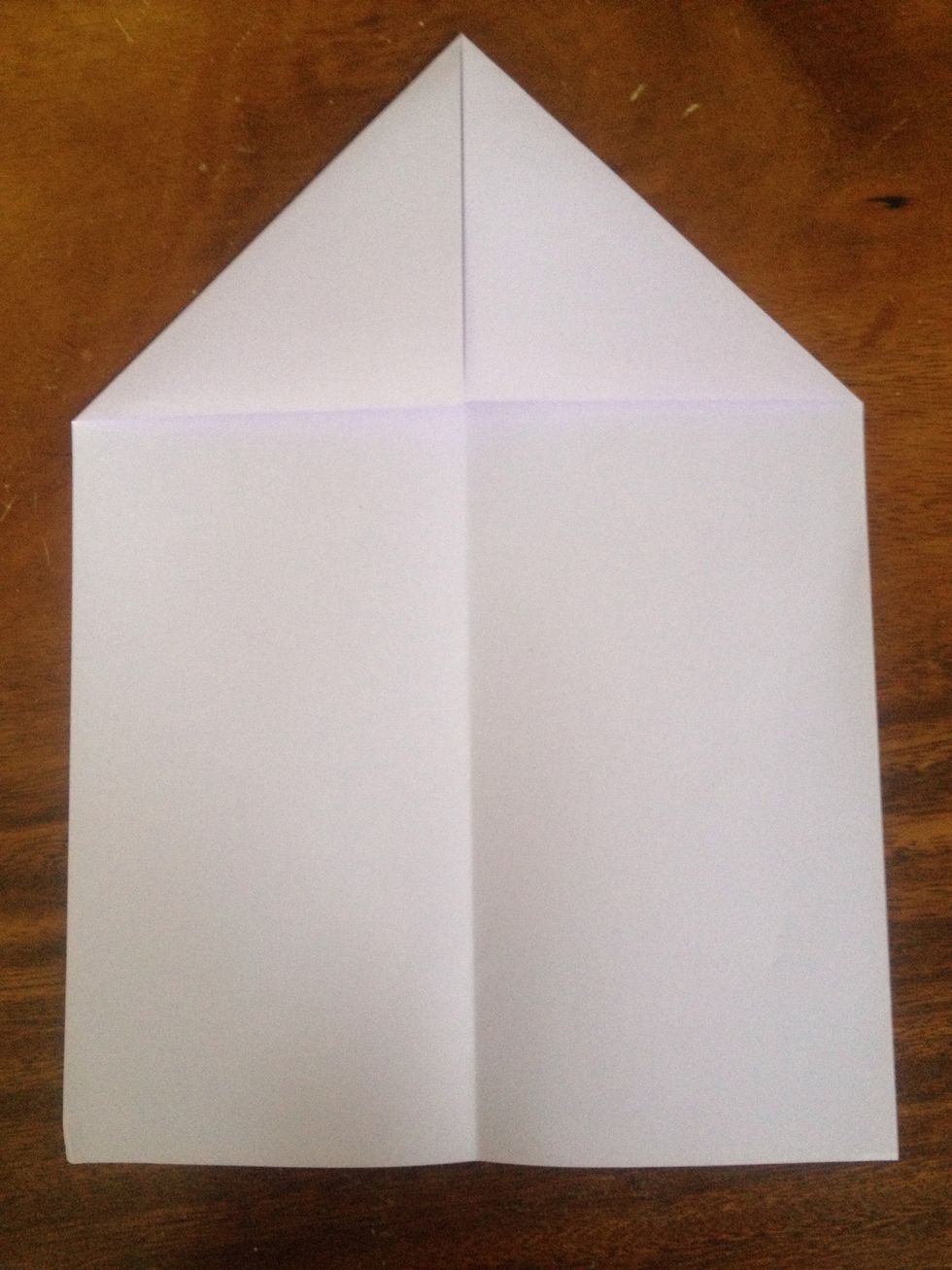 Fold the left corners to meet center line