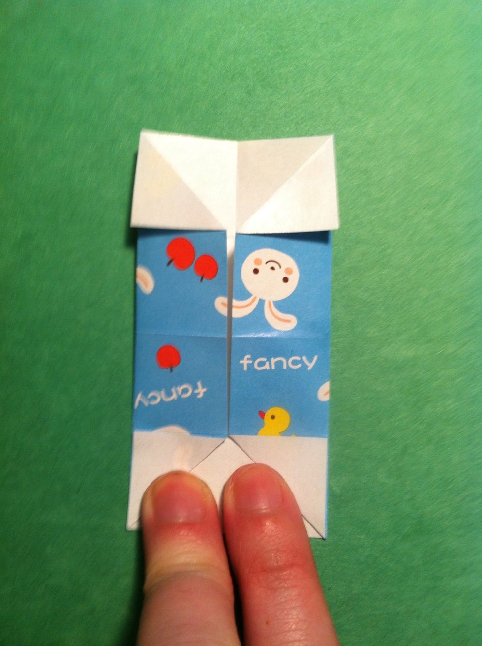 Fold the left edge & right edge back to the center crease.