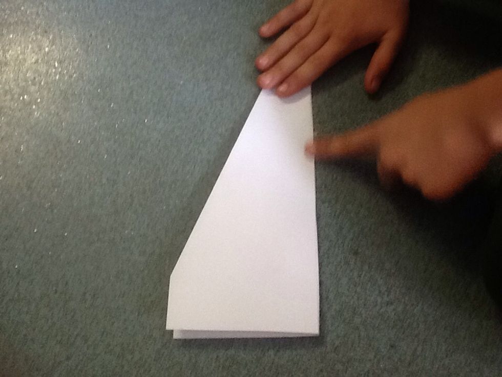 Fold the left side onto the right side, using the seam as a guide.