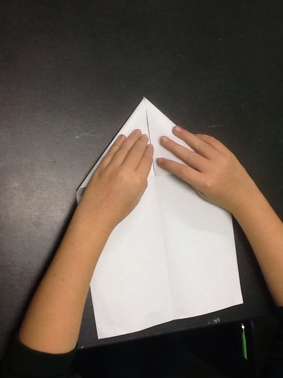 Fold the other corner into the middle crease