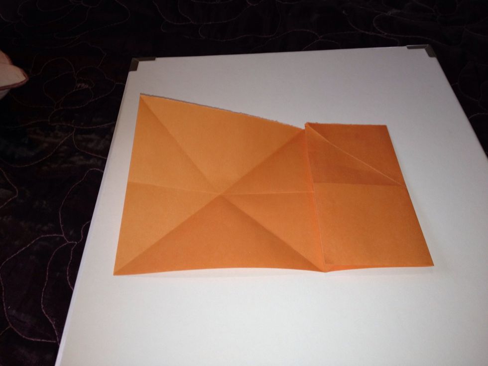 Fold the other end so that it comes to the centre