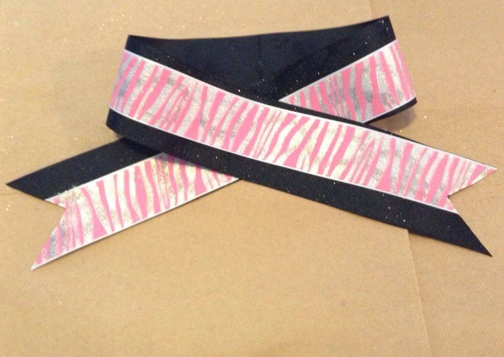 Fold the other pieces of ribbon overtop the crease guide so that there is an even ammount of desired ribbon on each side.