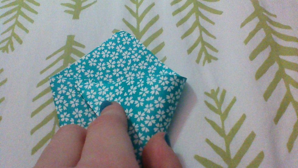 fold the other side across the same way as before.