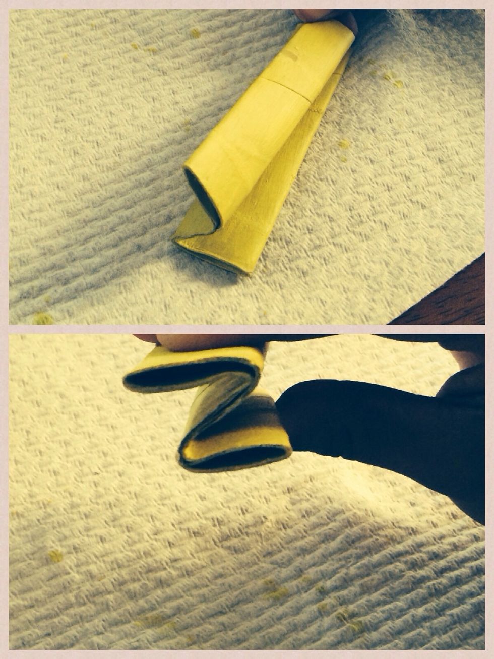 Fold the other side back to make a "Z" shape. You will have folded it into thirds.