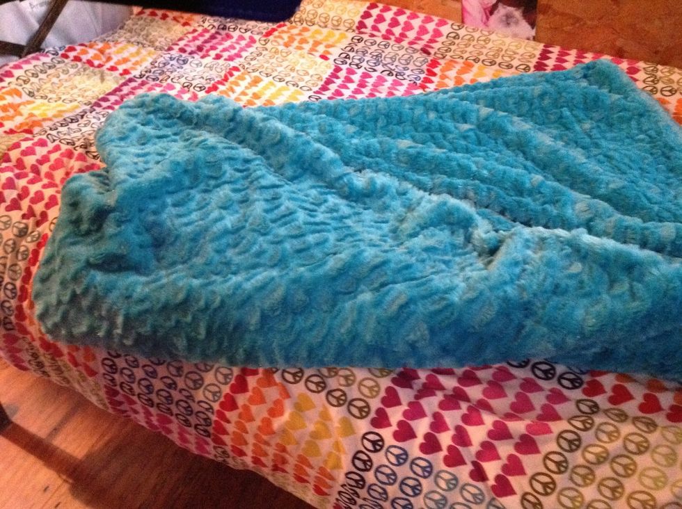 Fold the other side over the same way.