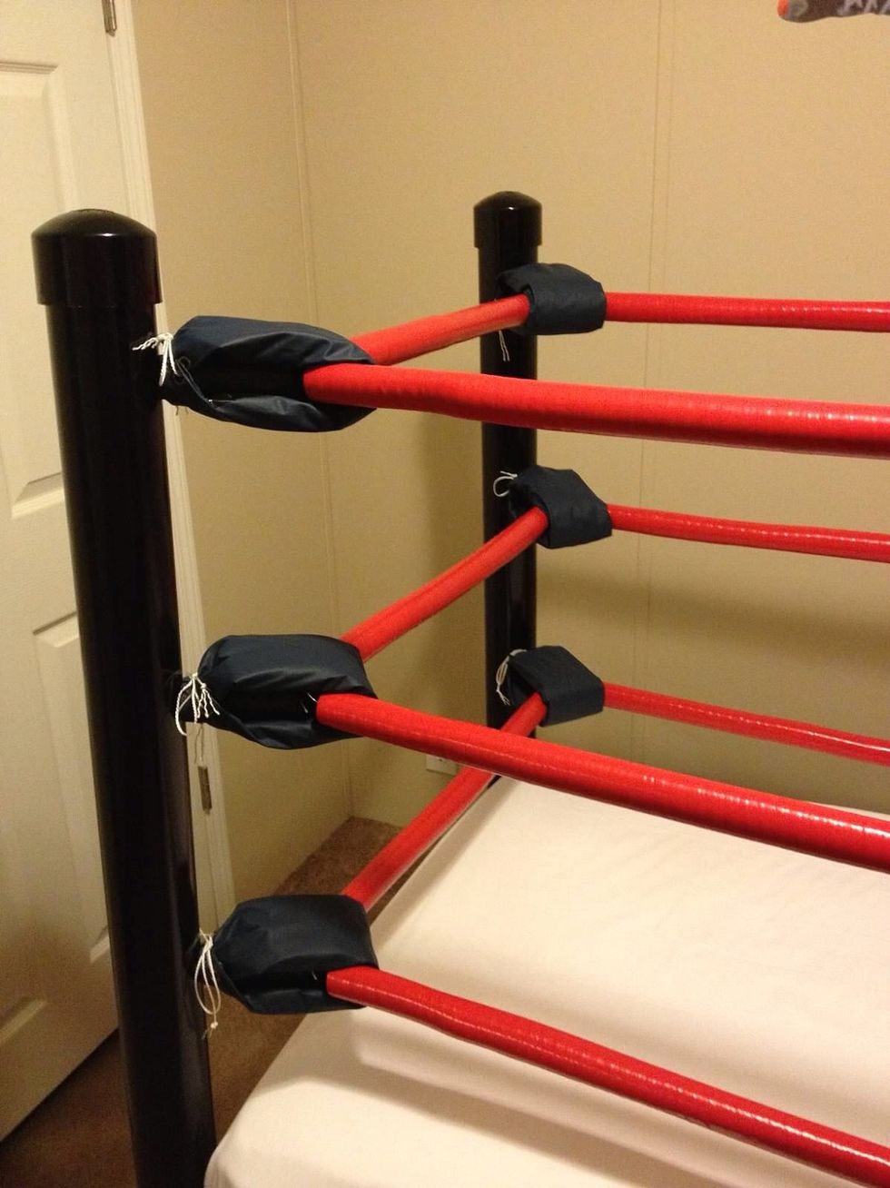 Fold the pads over the corner springs and tie.