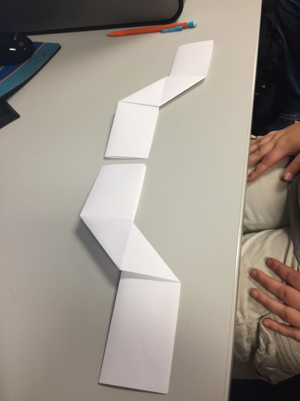 Fold the paper again to make this shape