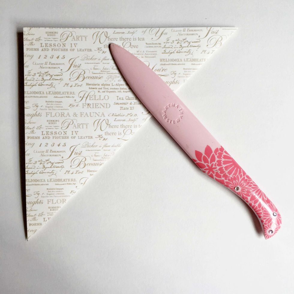 Fold the paper diagonally and give it a good burnish using a bone folder...