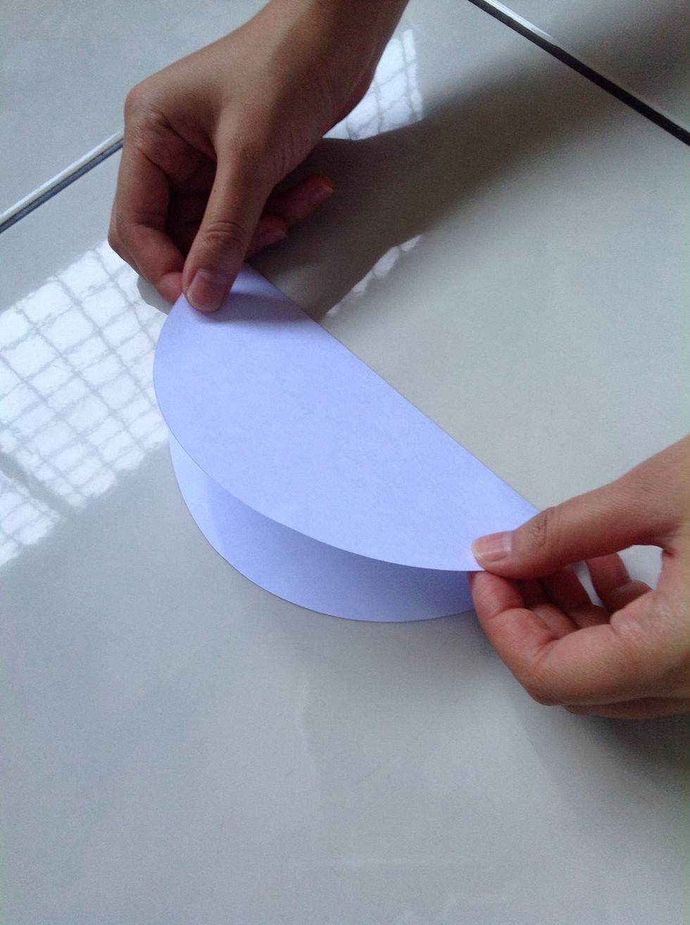 Fold the paper into half