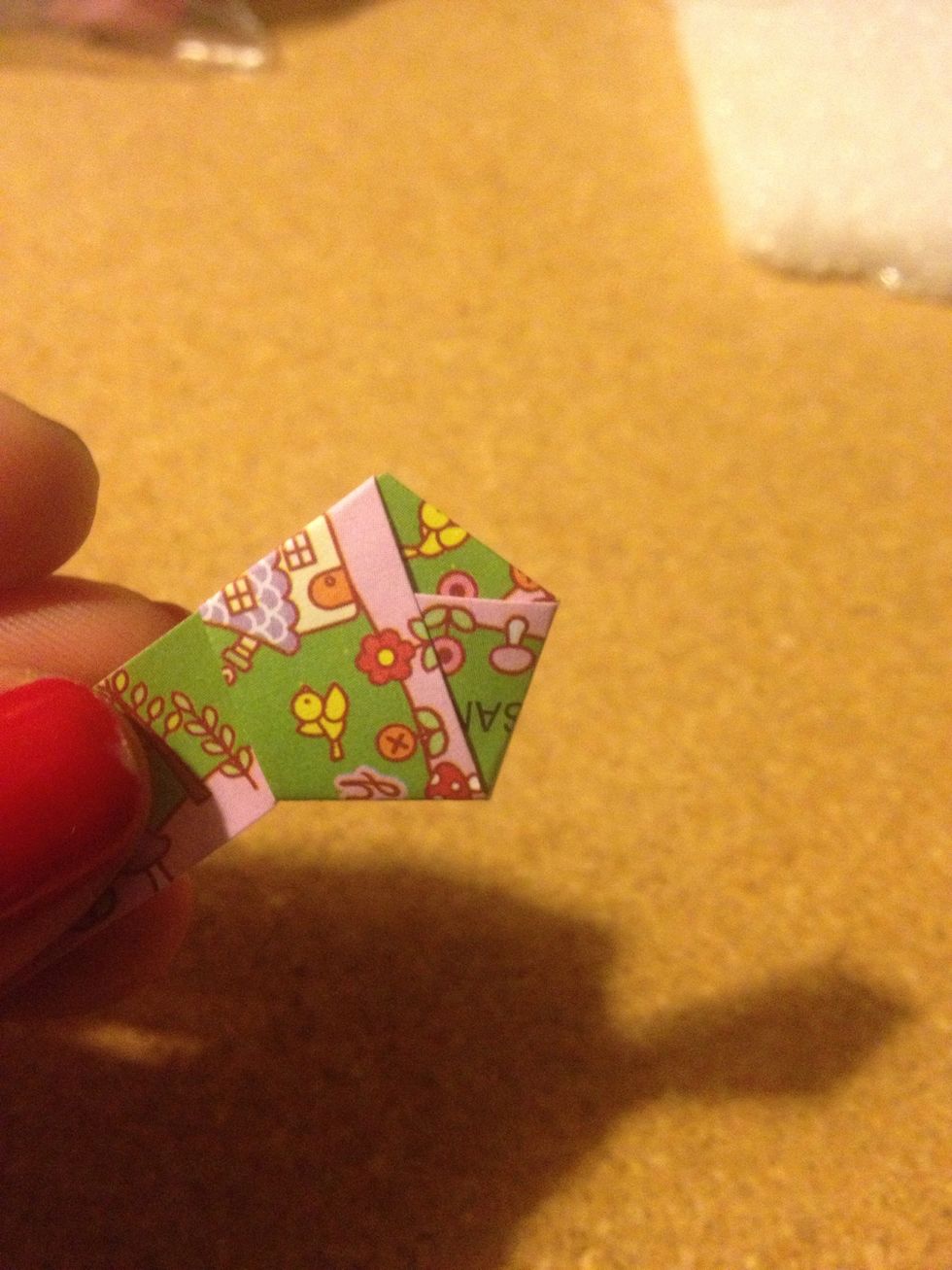 Fold the paper into the hexagon.