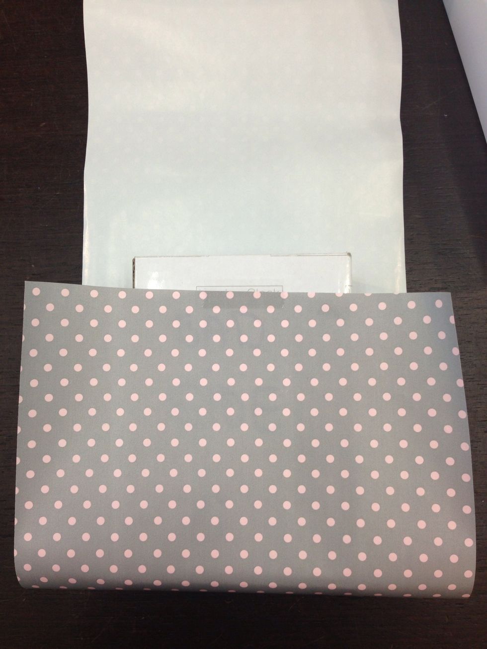 Fold the paper like this and stick it with tape