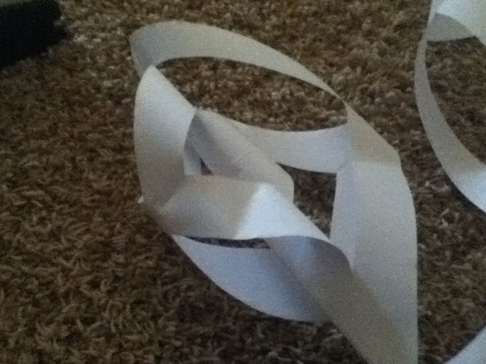 Fold the paper over on he back and tape the middle one over, it will be alone on the backside, looking like this