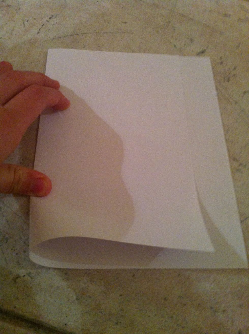 Fold the paper sheet to a wallet shape.