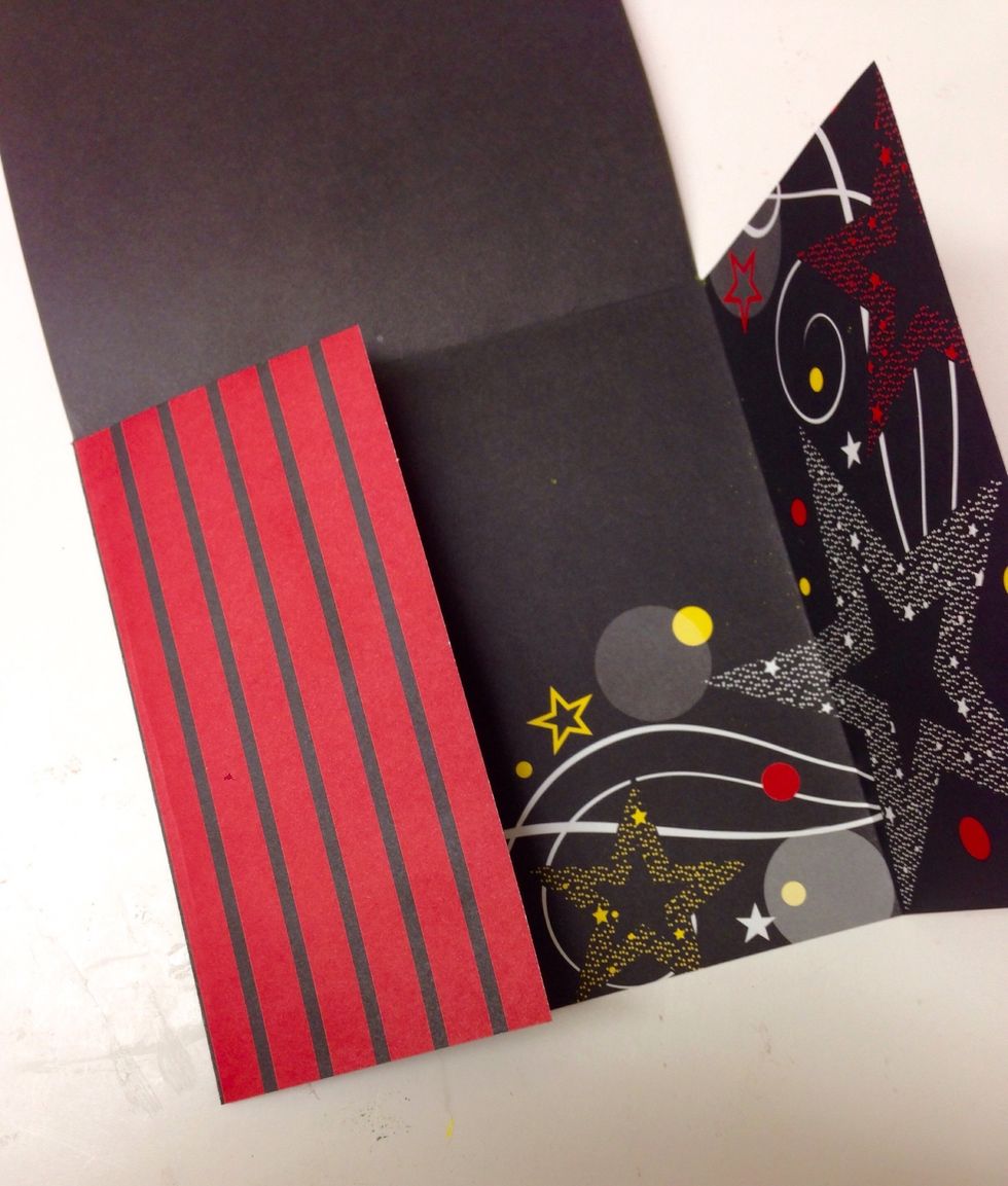 Fold the remaining flaps in so they meet in the middle and crease well. This establishes the basic structure of your book.