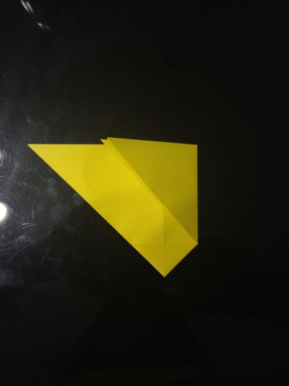 Fold the right corner as seen in the picture.