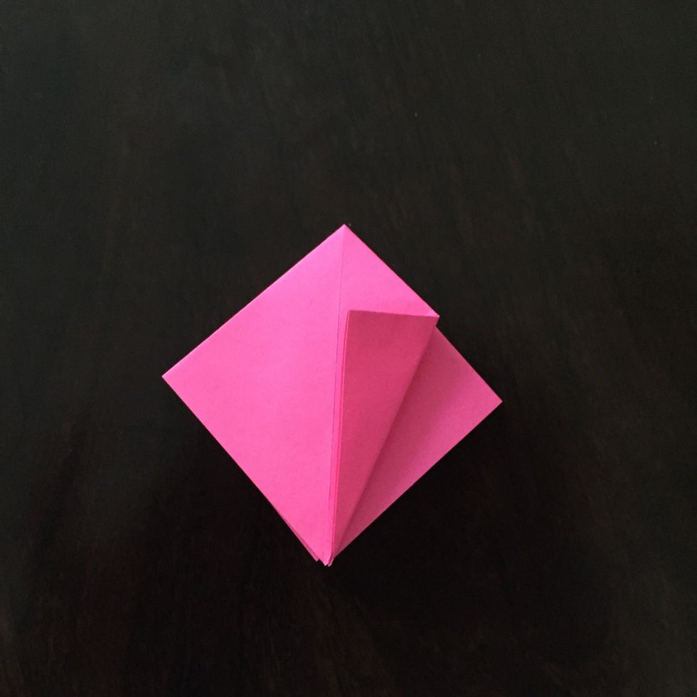 Fold the right corner into the middle.