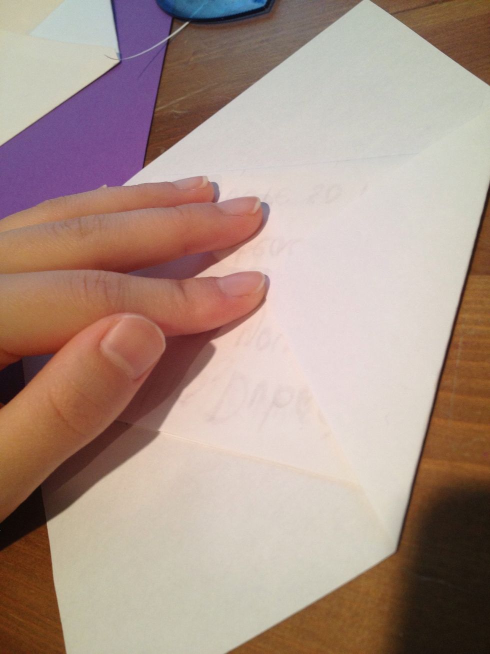 Fold the right corner up to the edge of the card. You can leave a little space web you fold it if you want the card to fit loosely.