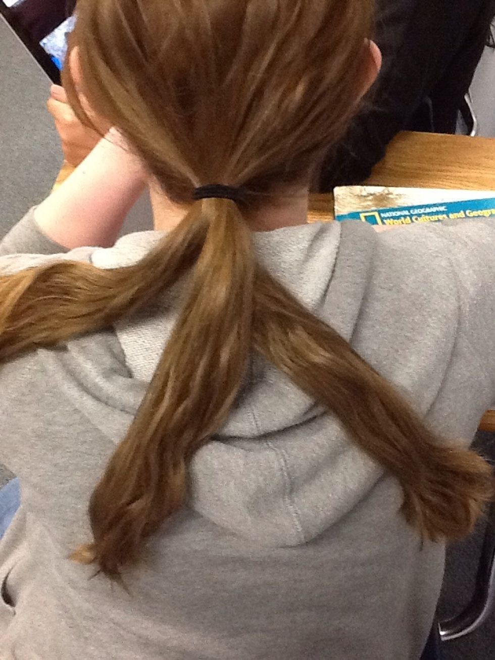 Fold the right section over the middle to make it the new middle section.