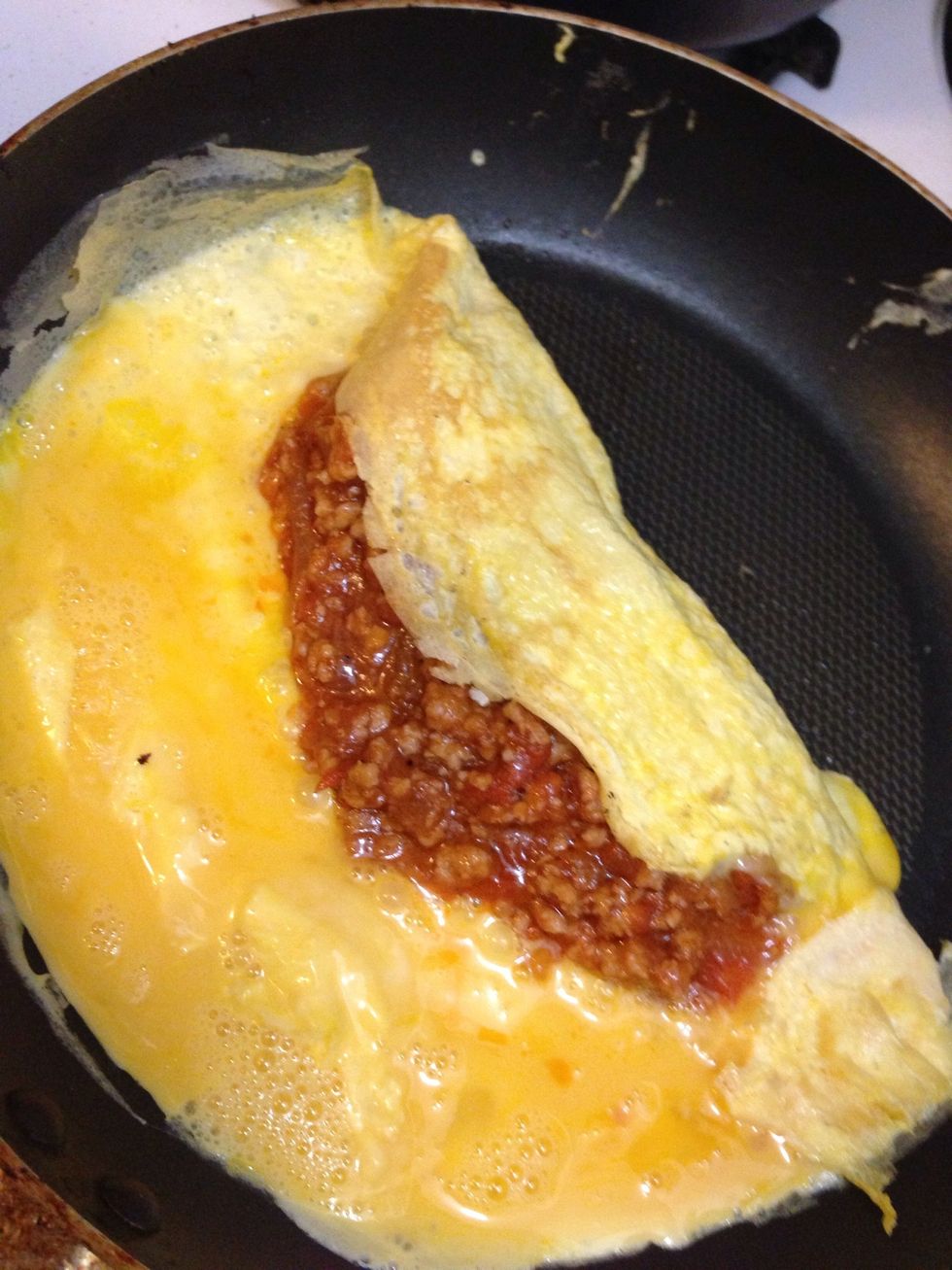 Fold the right side and fold the left side. Make sure none if the mean mixture coming out.