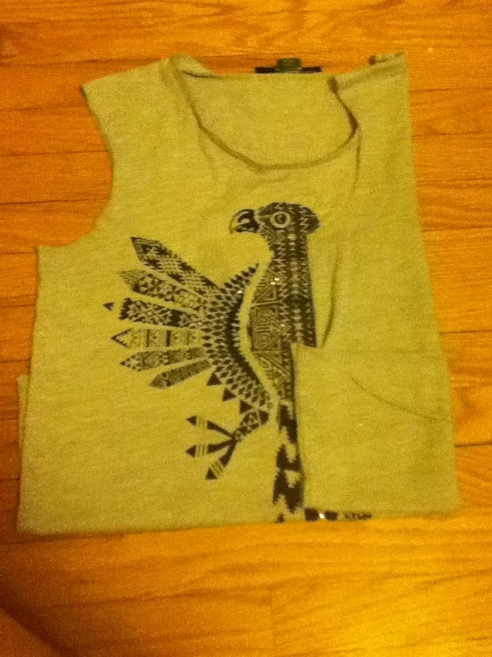 Fold the right side of your shirt half way in like the picture above.