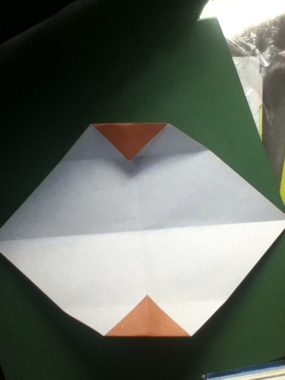 Fold the same corners to the creases just made