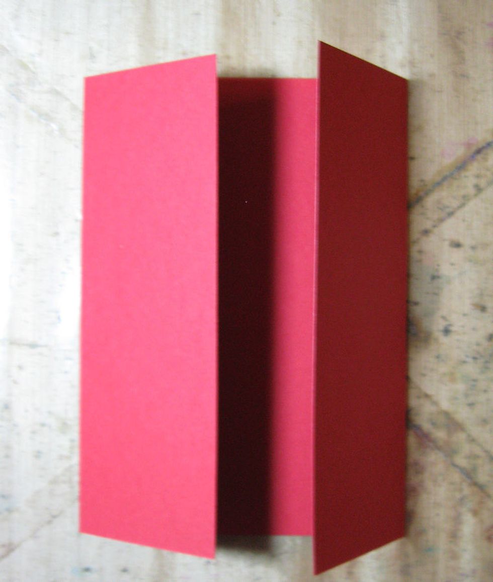 Fold the scored lines in toward the center of the card, as seen here. Crease well with a bone folder. This is our gatefold card base.