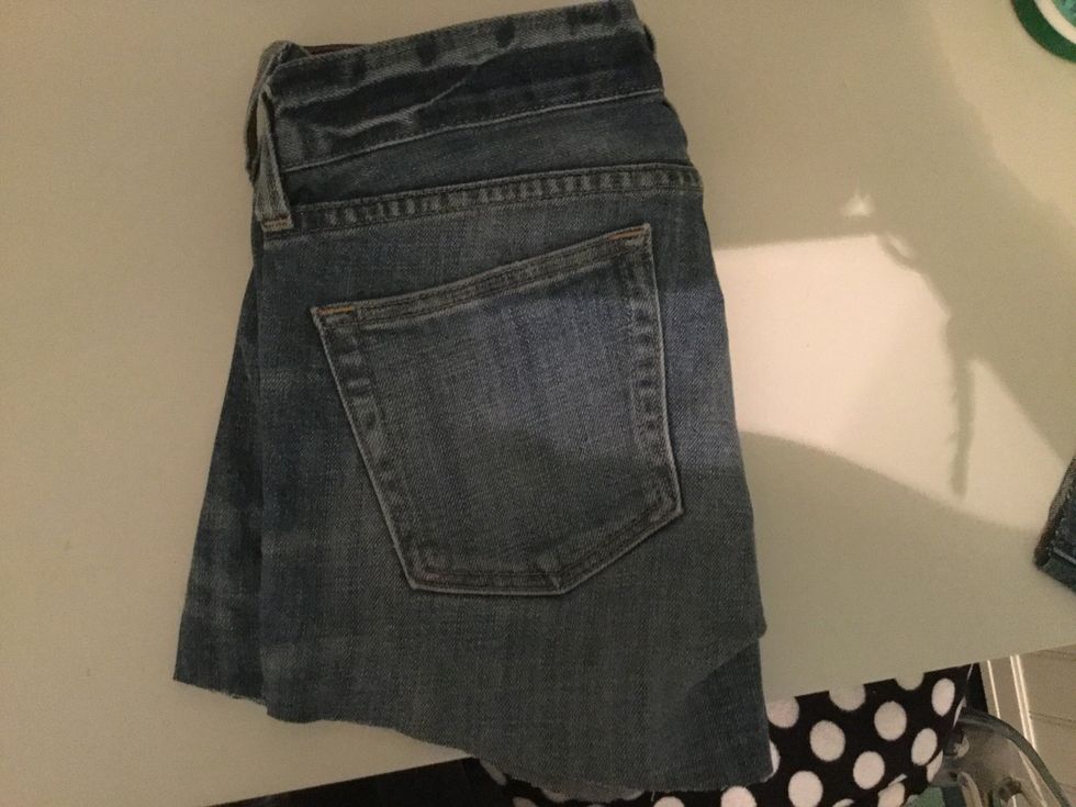 Fold the shorts to make sure that both pant legs are the same length. Cut them if you need to make them even