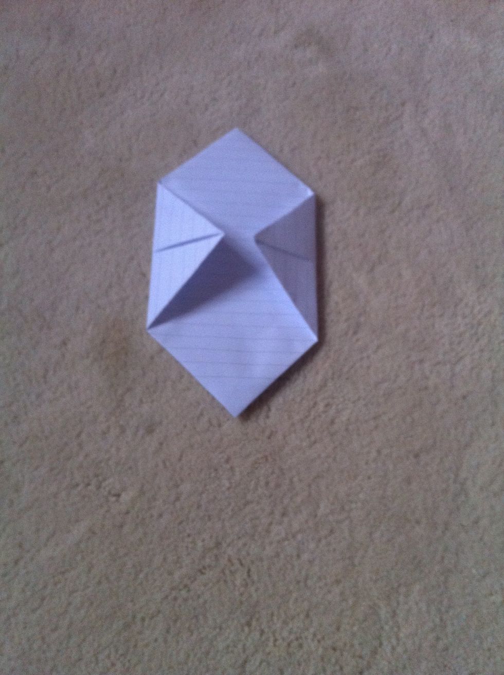 Fold the side corners in