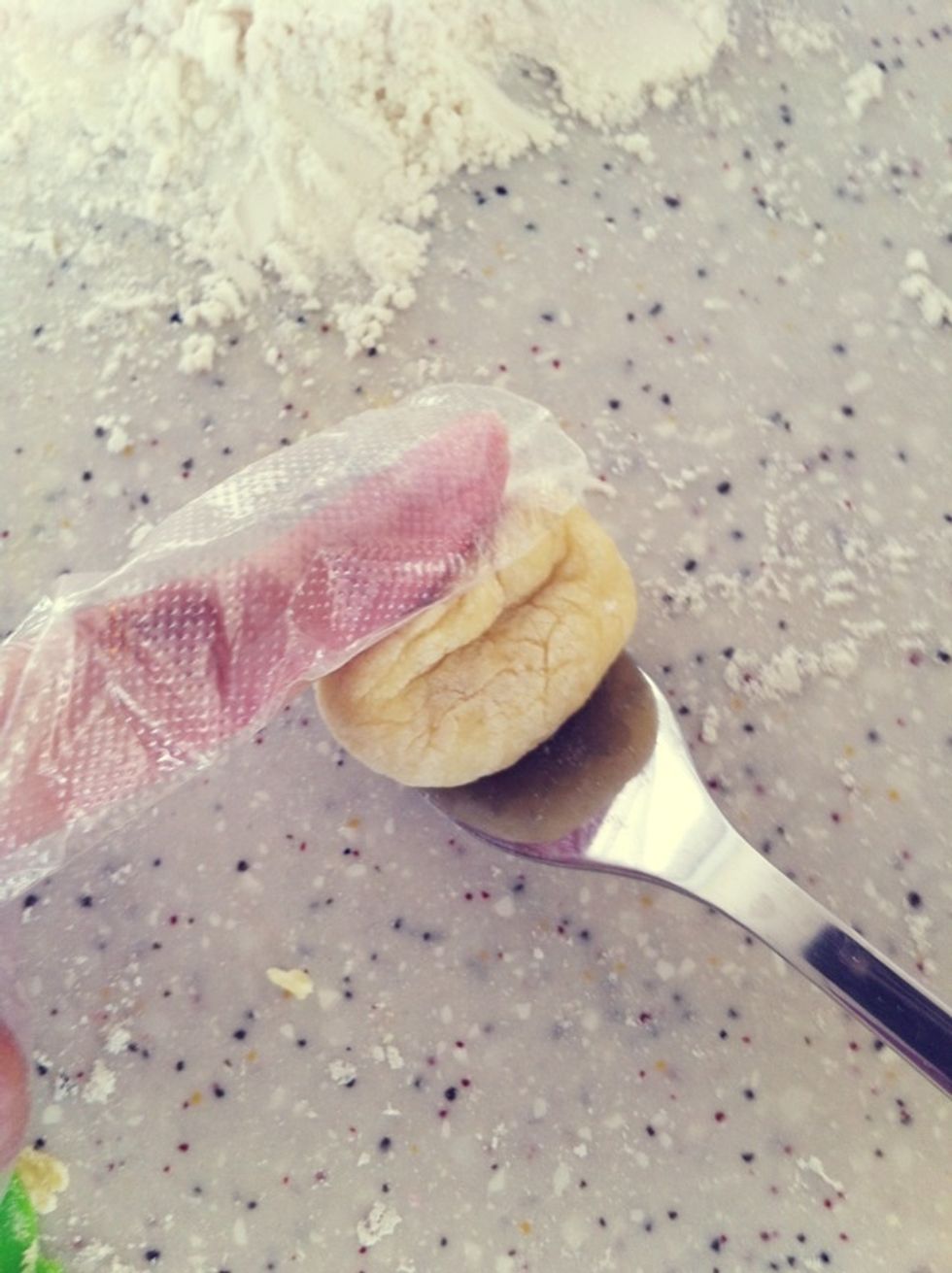 Fold the side over while rolling to the center to create the lines for the back.