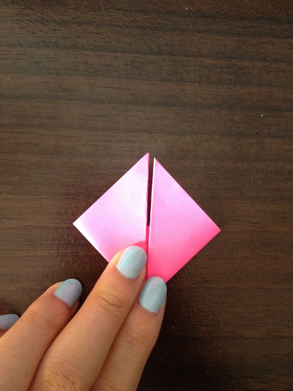 Fold the sides again.