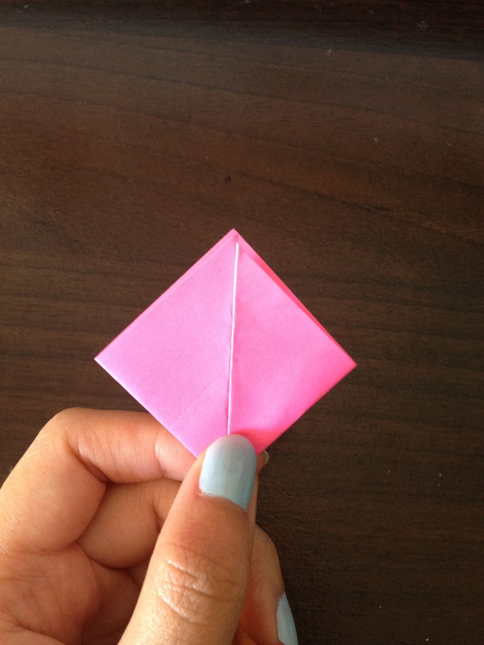 Fold the sides of the triangle.