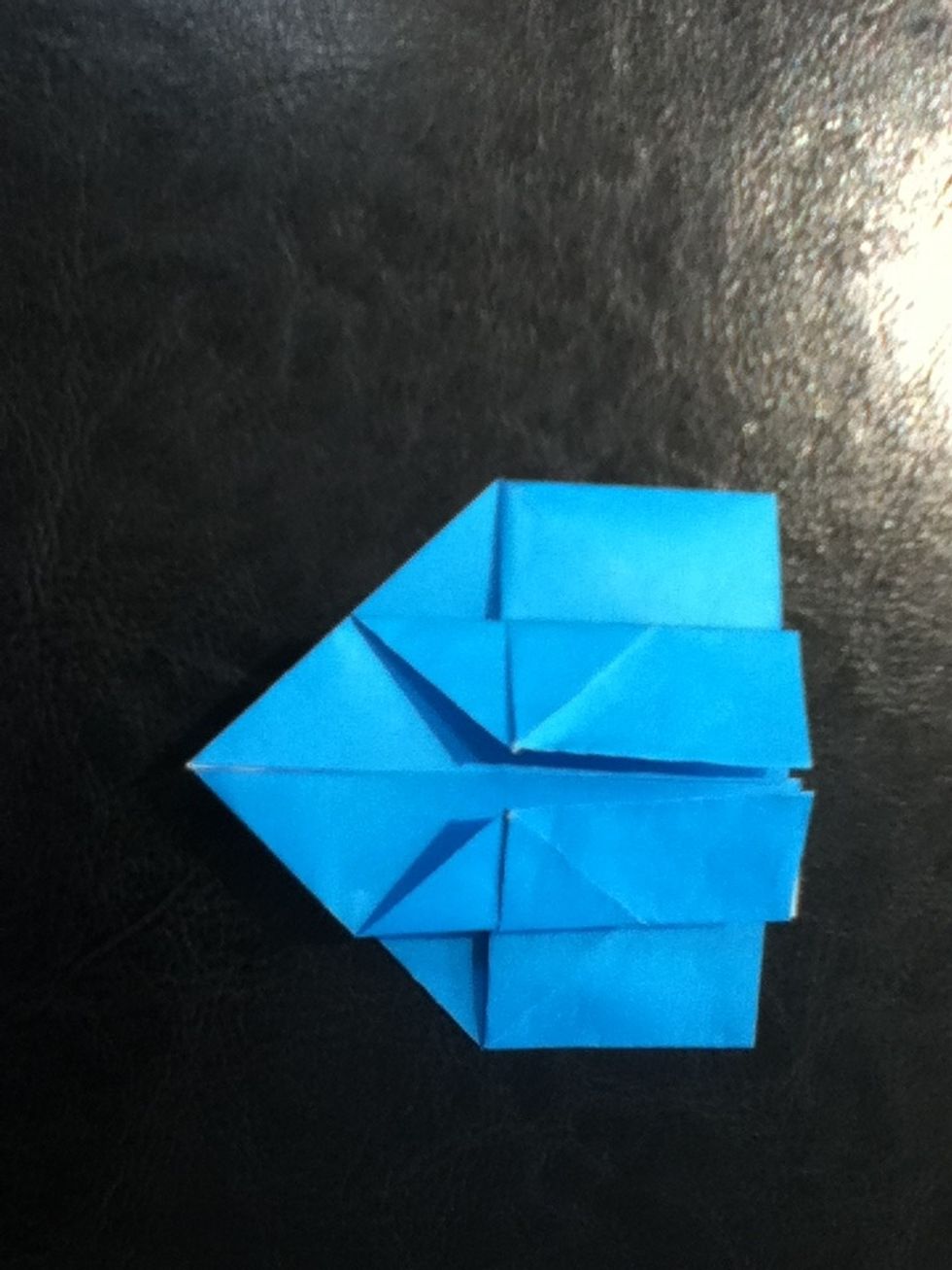 Fold the sides to the center.