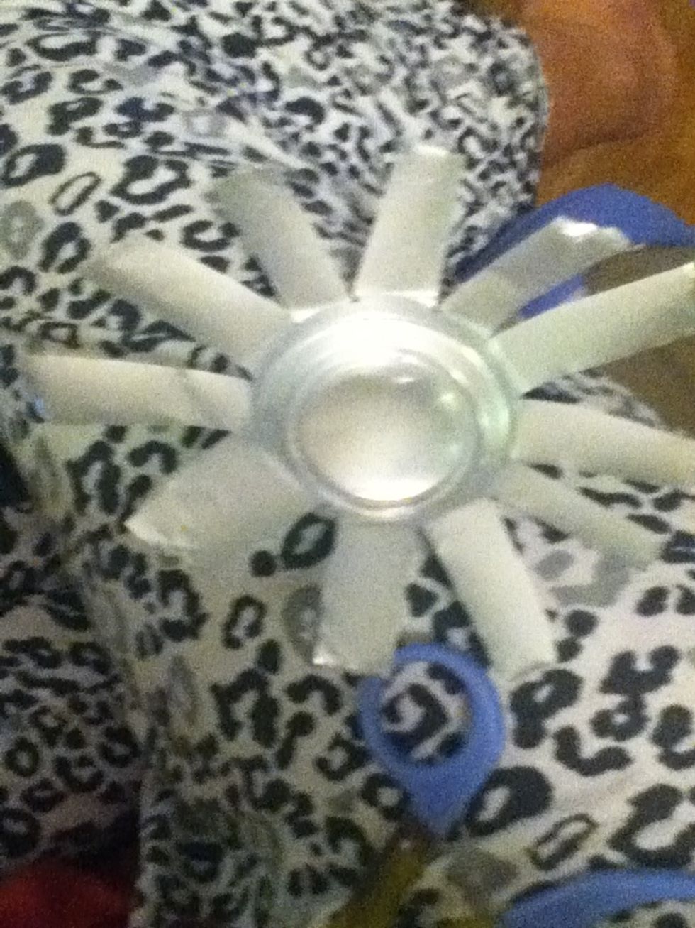 Fold the slits down so it will look like this.