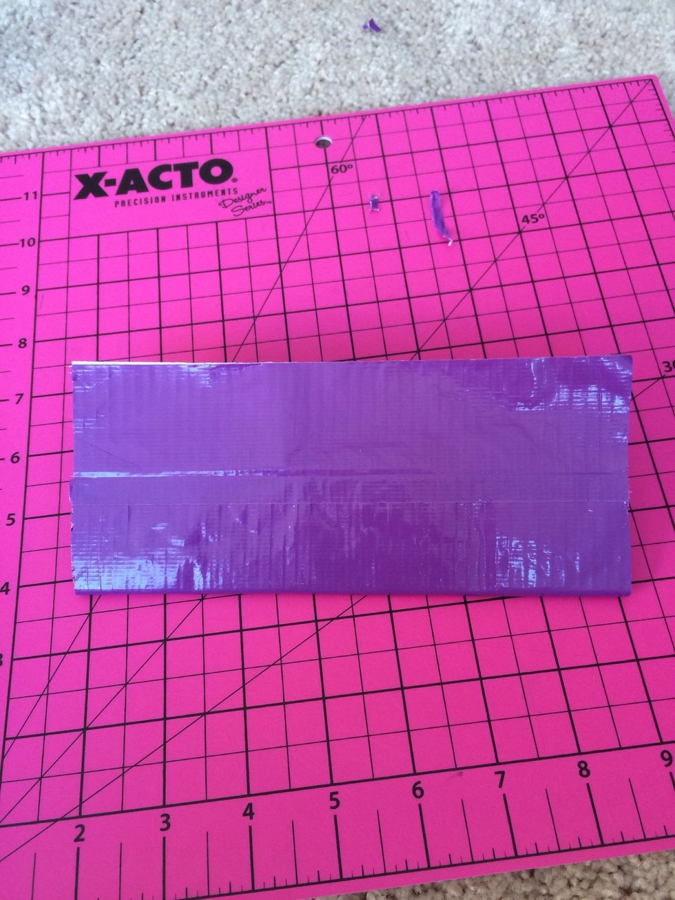 Fold the sour strips you have, so it looks like a rectangle.