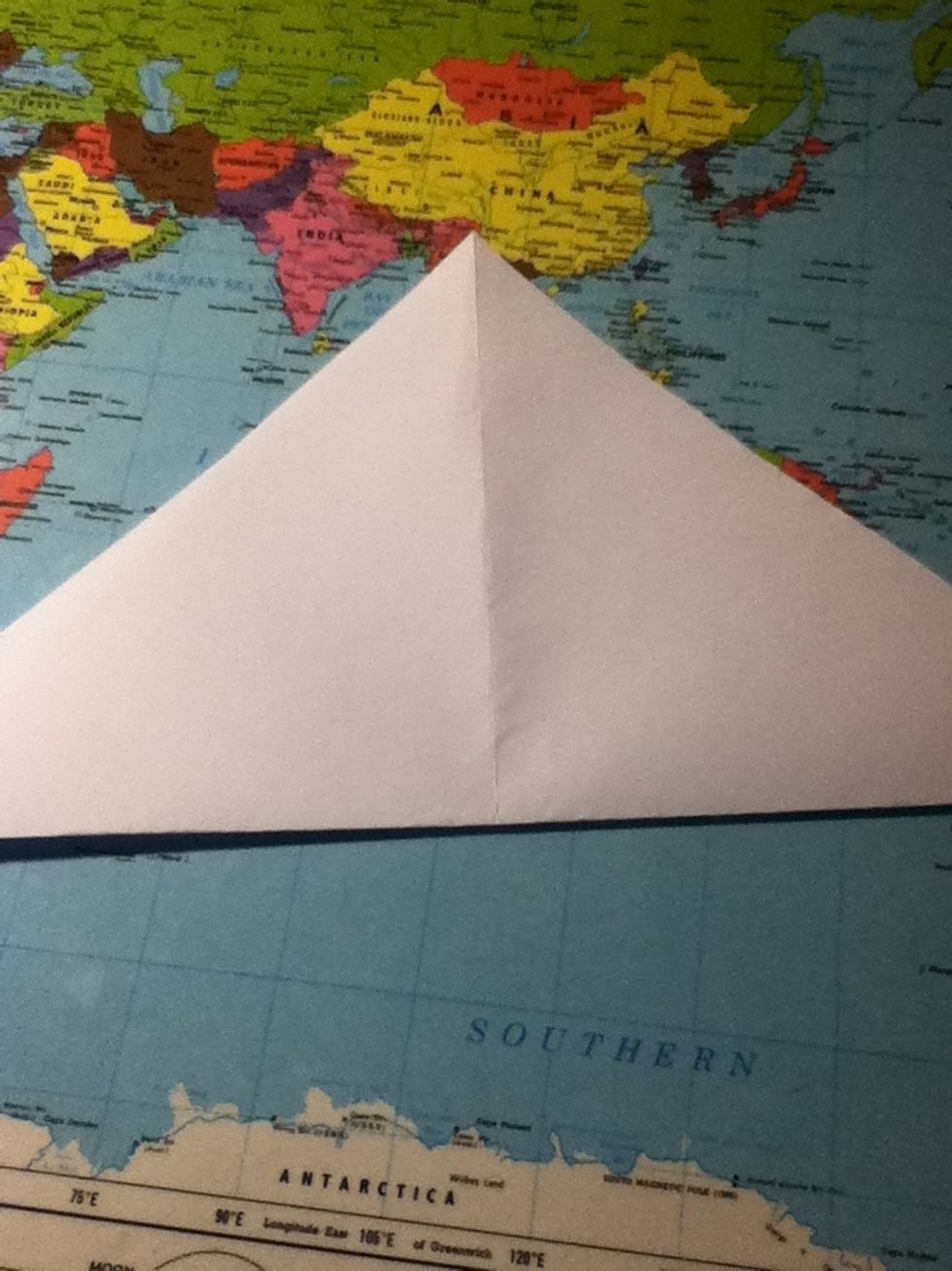 Fold the square in half diagonaly