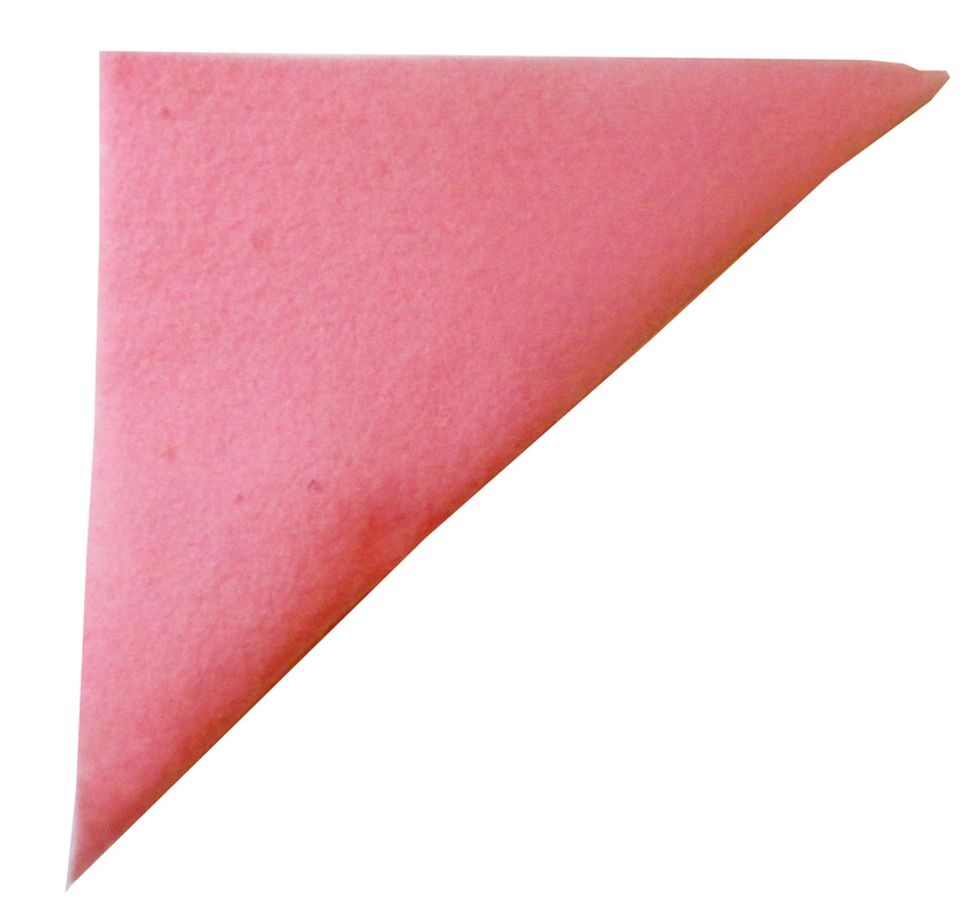 Fold the square over to make a triangle, with the glued edge at the top as shown. Press to seal the edge and allow glue to dry.