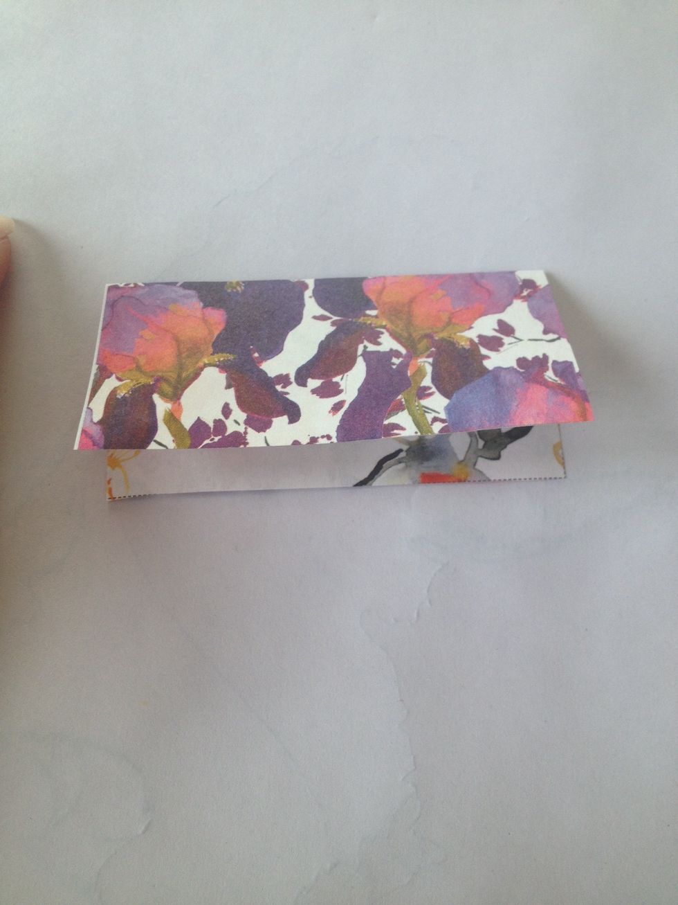 Fold the square paper in half