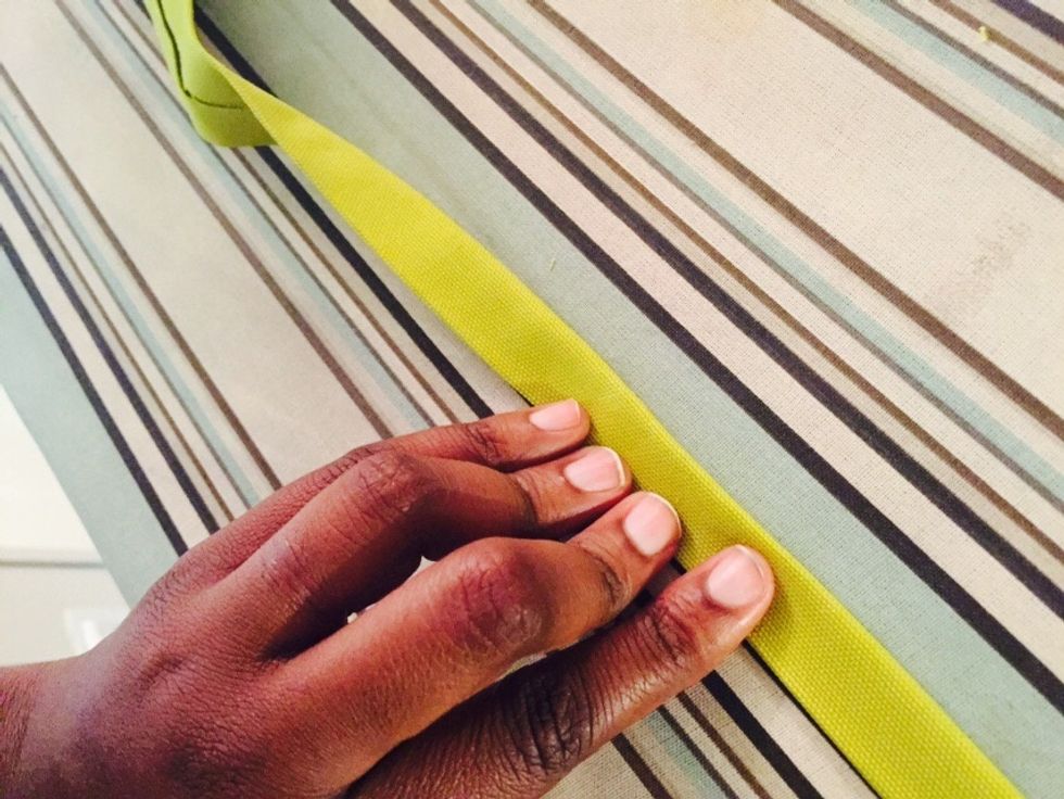 Fold the strap over again and press one more time.