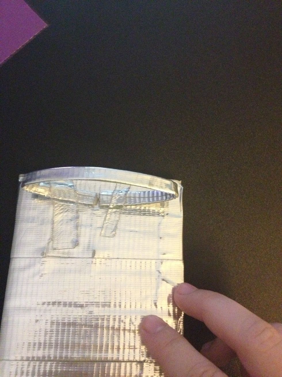 Fold the strip so that it is the length of the place you want to put it on your strip. I just quickly taped it down so I could take a picture easily.