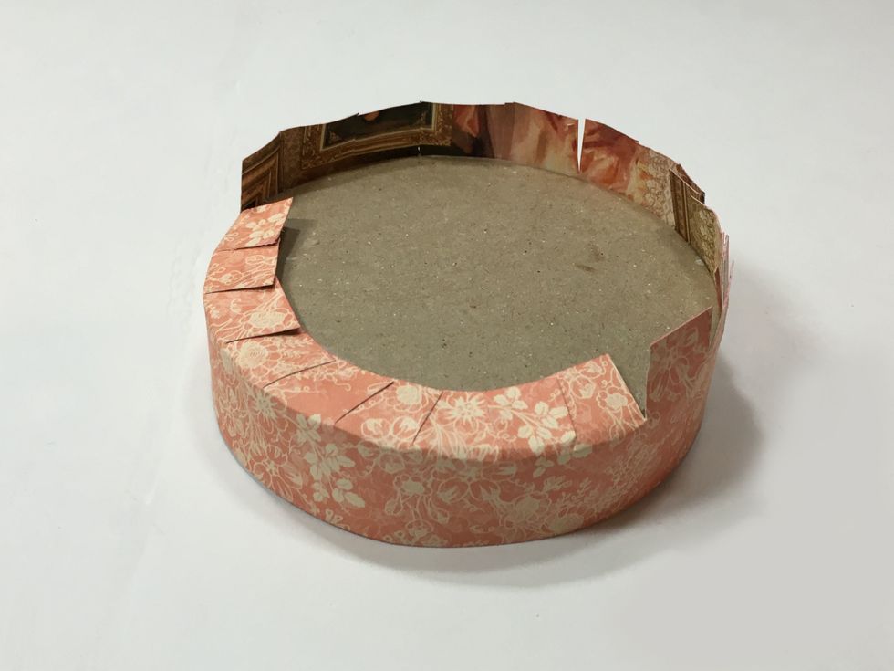 Fold the tabs down and glue all around to the top of the lid.