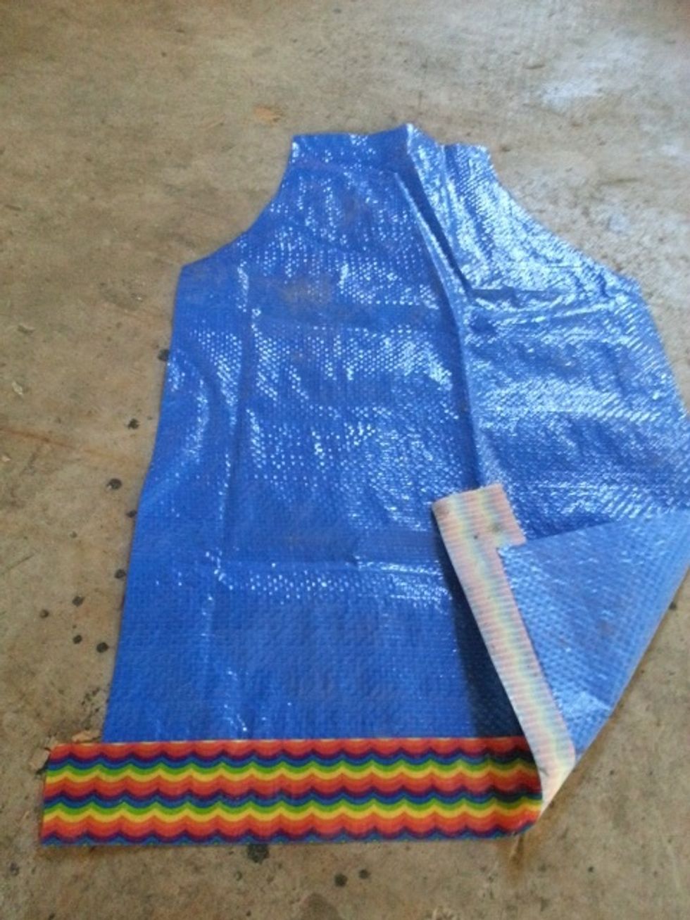 Fold the tape over length wise to "hem" the bottom.