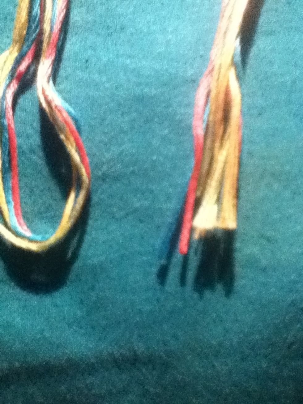 Fold the thread make sure the ends are the same length and don't cut the loop at the top